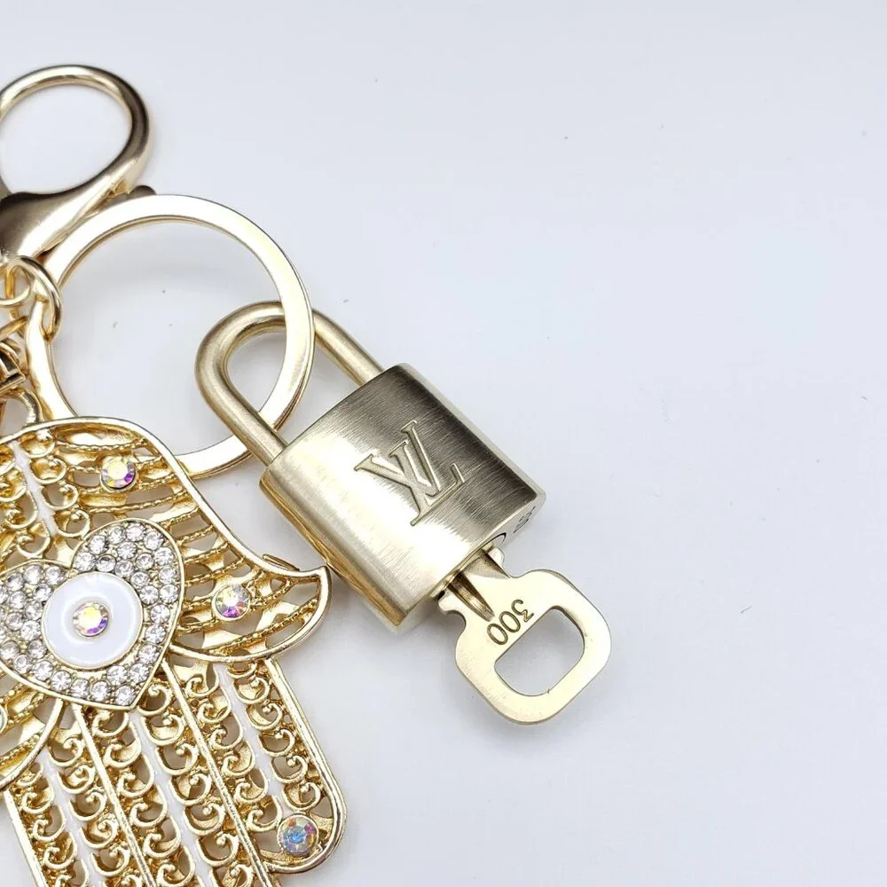 Louis Vuitton Gold Lock 🔒 Authentic LV Key + Unbranded Evil Eye Bag Charm